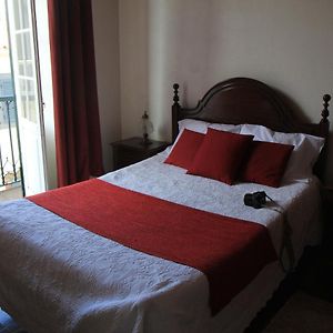 Kamer met een Queen Size Bed